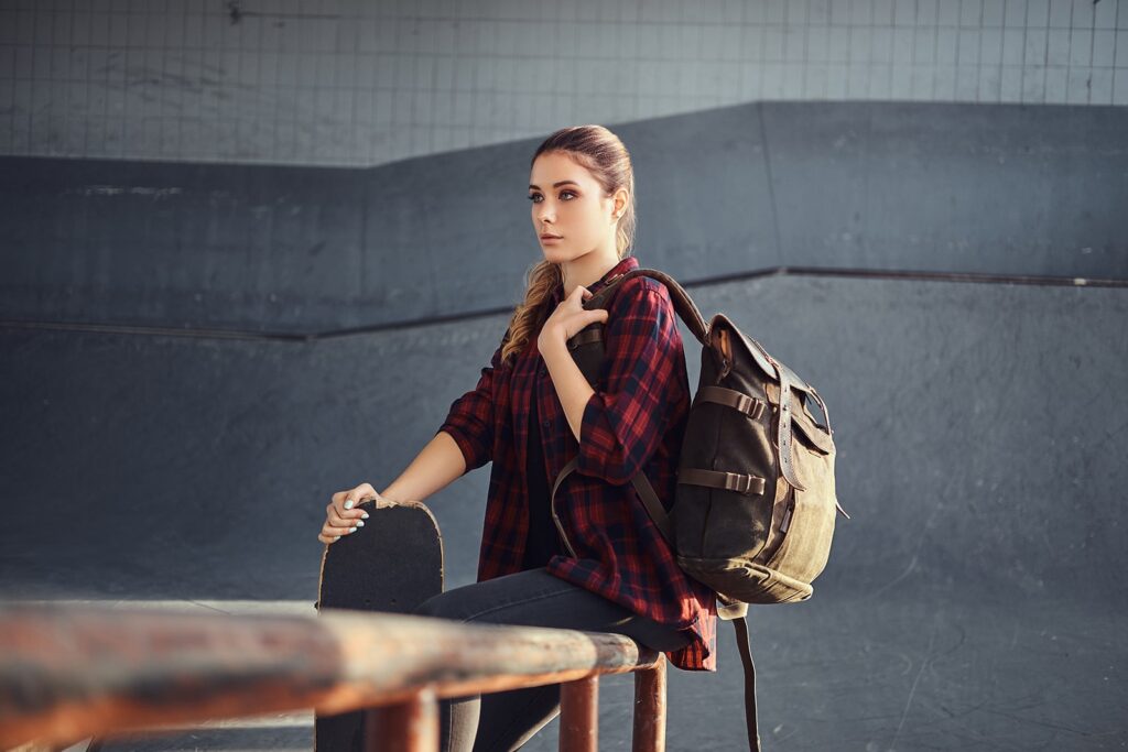a-student-girl-with-a-backpack-wearing-a-checkered
